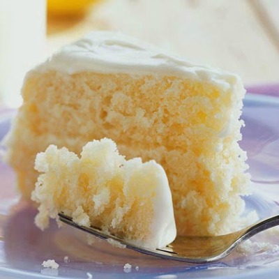Lemonade Layer Cake - This cake is the perfect solution to summer birthday parties or winter events when you need to wake up your taste buds. Light, delicious, and a favorite for the whole family!