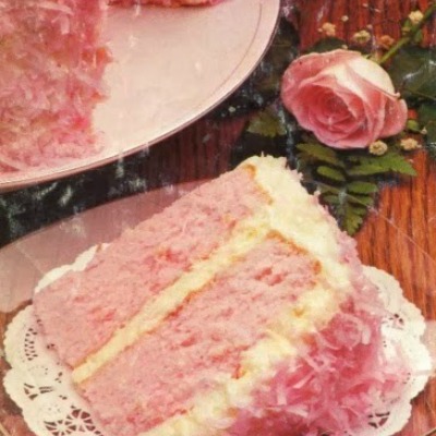 Strawberry Colada Coconut Cake ~ Looks beautitful AND tasty! If you love strawberries and coconut this cake is a must dessert. 