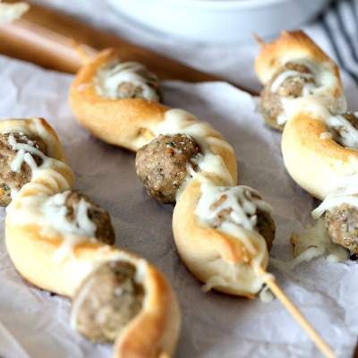 Meatball Subs on a Stick ~ A super fun spin on the classic! This recipe uses turkey meatballs so they are low fat as well as delicious! And a little variety from your local sub shop!