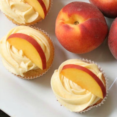 Peach Cupcakes with Peach Cream Cheese Frosting. These are very yum and healthy, and the presentation is fantastic!